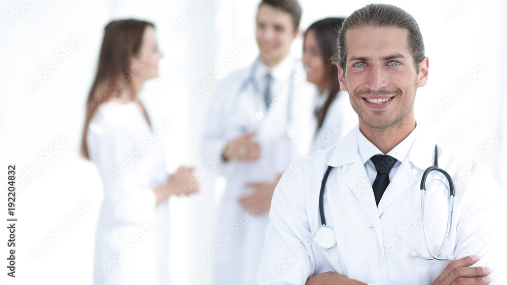 smiling doctor therapist on blurred background. smiling doctor therapist on blurred background.