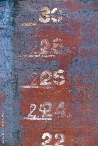 Old painted and rusted metal wall surface