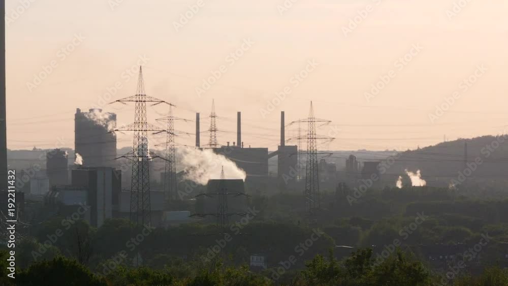 Essen industry with smokestacks in evening sun Essen industry with smokestacks in evening sun