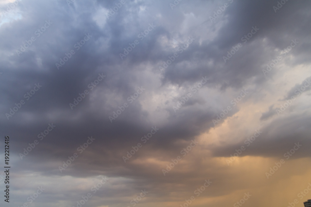 Autumn sky with dark colors and very gray clouds and rain-laden