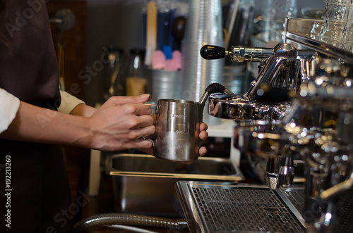 The barista preparing espresso with machine at coffee shop. start up small business owner food and drink concept