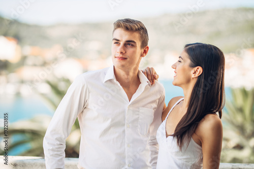 Happy couple in love on a summer holiday vacation.Celebrating holiday,anniversary,engagement. Successful man in relationship with beautiful woman.Support and encourage concept.Decision in relationship © eldarnurkovic