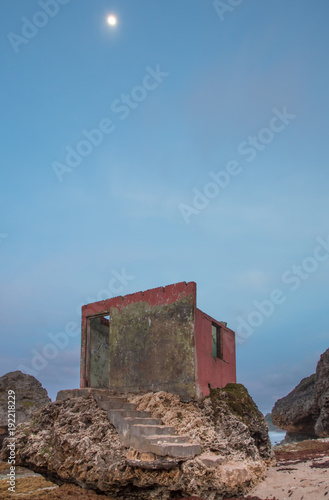 An Interesting Ruined Building on top of Rocks at the Coast