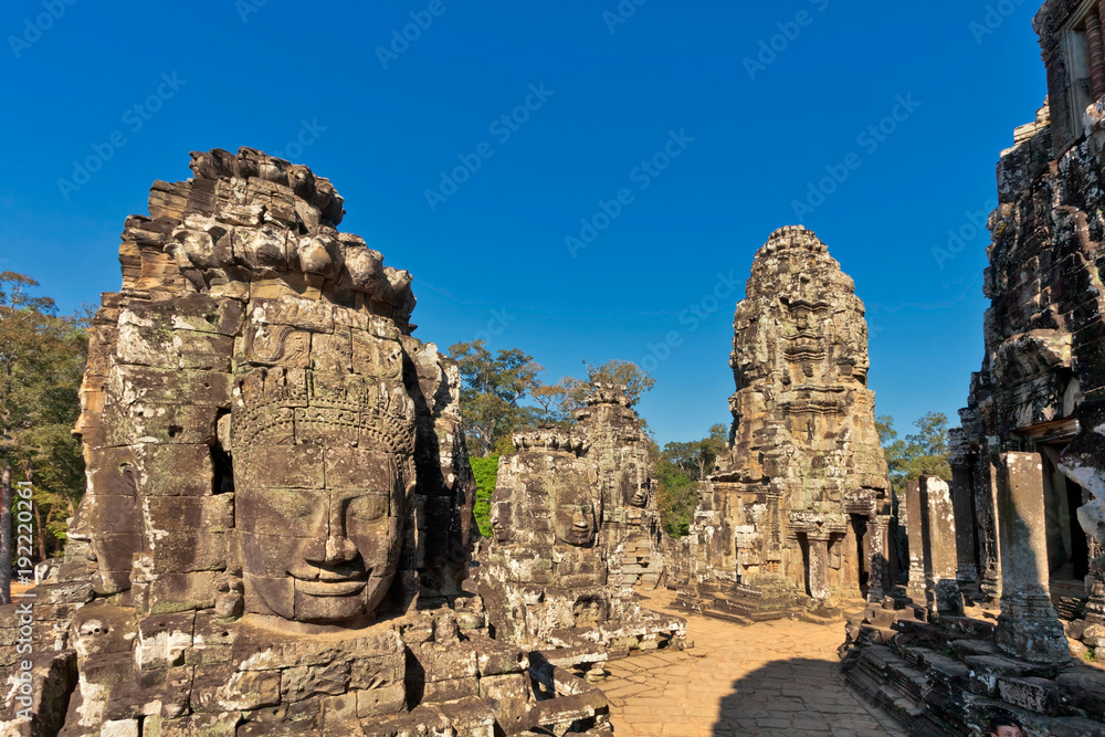 Faces of ancient Bayon Temple At Angkor Wat Faces of ancient Bayon Temple At Angkor Wat