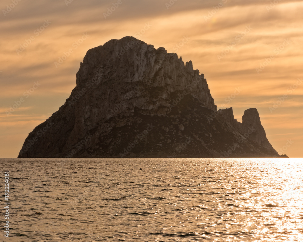Sunset in Ibiza next to the island of Es vedra