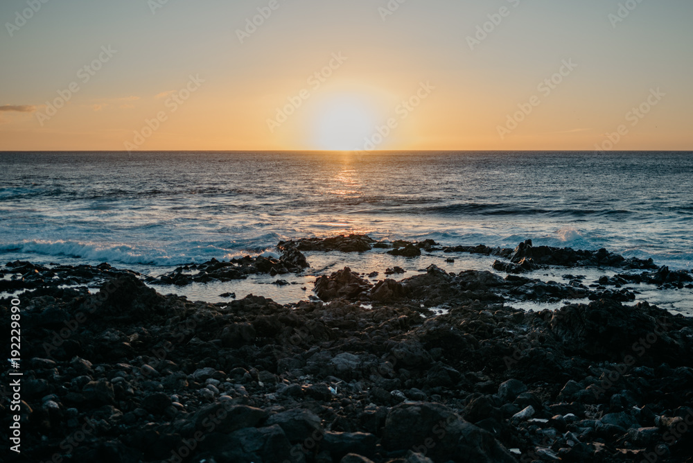 Beautiful sunset over the ocean and rocky coast. Tenerife Beautiful sunset over the ocean and rocky coast. Tenerife