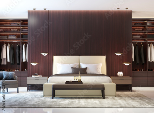 Modern luxury bedroom with dark wood walk in closet front photo