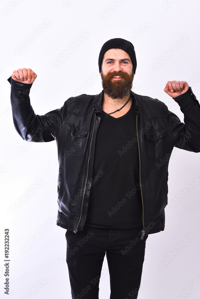 Naklejka premium Street life style concept. Rock fan or gangster stretches muscles