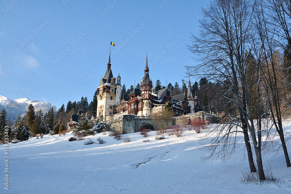 Peles Castle in winter time, located in the Carpathian Mountains, Sinaia, Romania