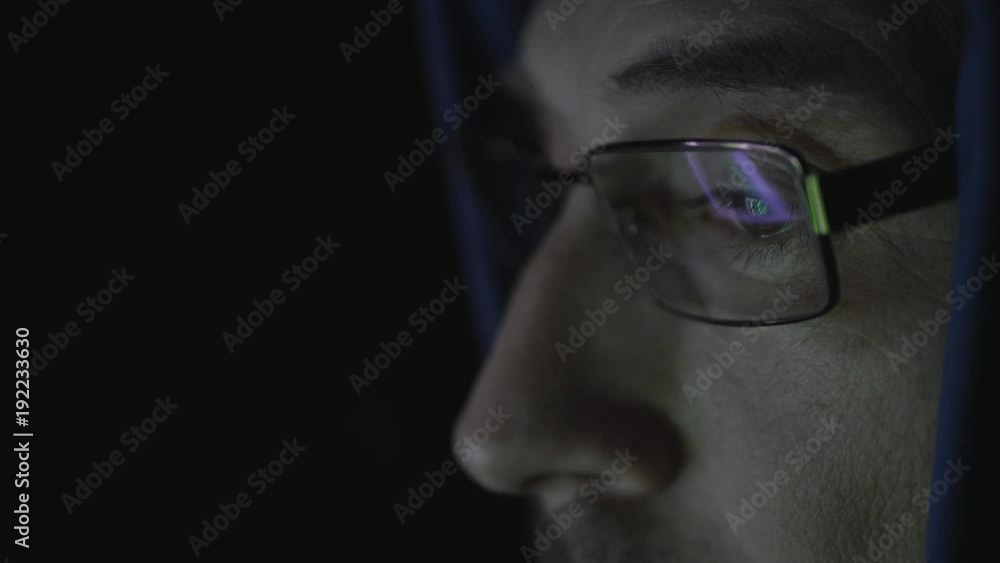 man behind the computer monitor. Internet Addiction Reflection Hacker Crime Glasses Browsing Late Night Code Cyber Terrorism Password Hacking Uhd 4K man behind the computer monitor. Internet Addiction Reflection Hacker Crime Glasses Browsing Late Night Code Cyber Terrorism Password Hacking Uhd 4K