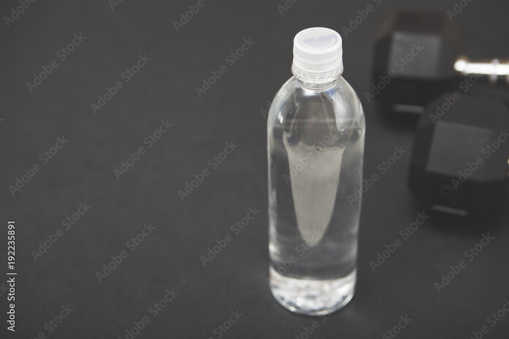Water at gym for workout. Fitness hydration Water at gym for workout. Fitness hydration