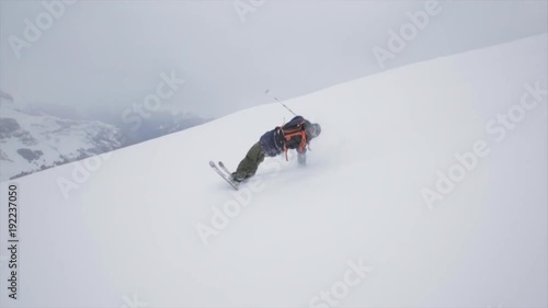 POV, skier does tricks down mountainside