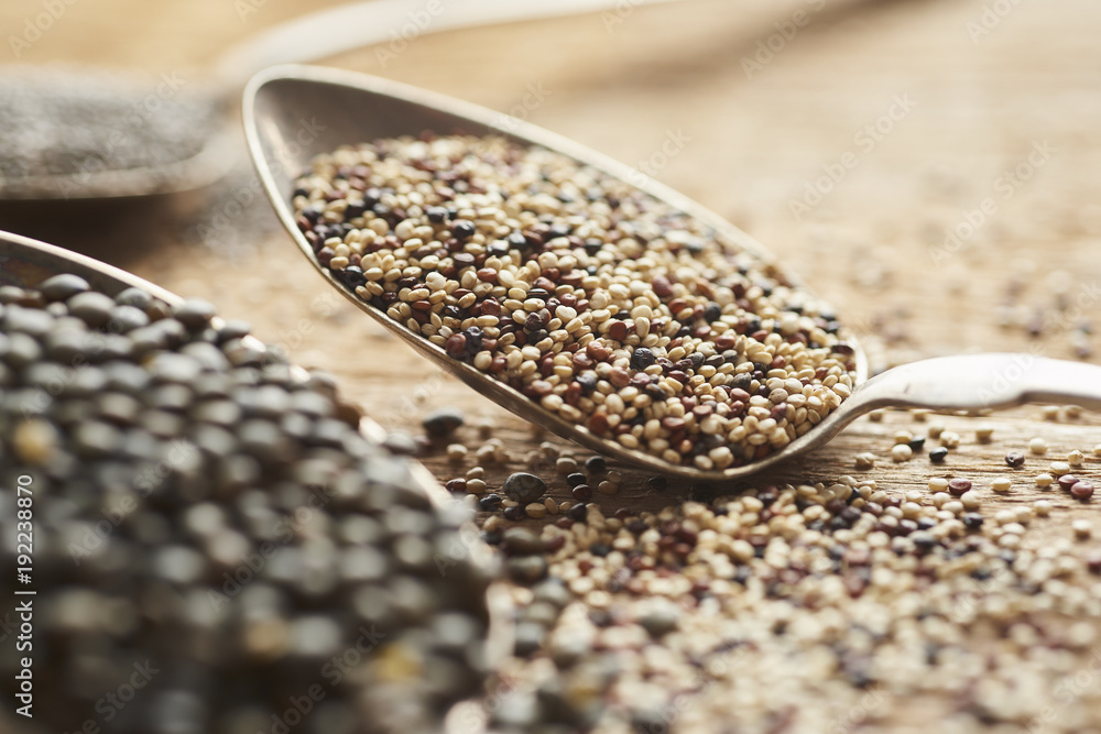 mixed quinoa seeds on old retro silver spoon mixed quinoa seeds on old retro silver spoon