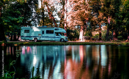 Family trip in motorhome in forest or park in South Chile photo