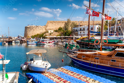 Boats moored in Kyrenia (Girne) harbour with fortress on background