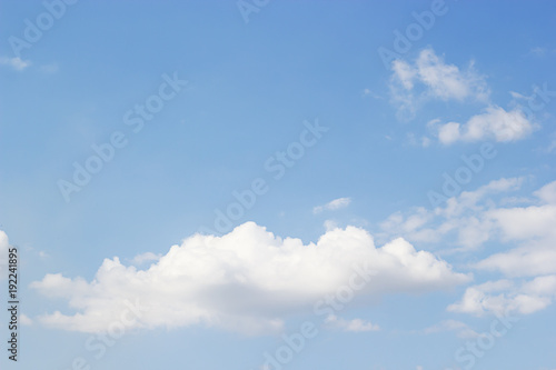 Blue sky background and white clouds soft focus, and empty space