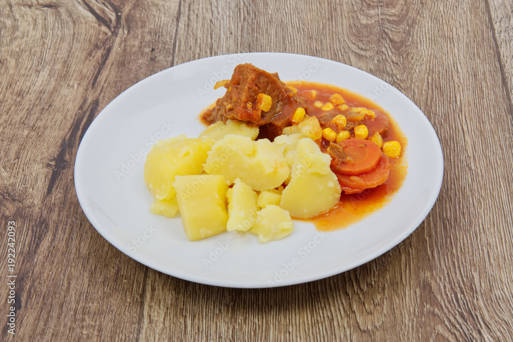 Mexican goulash with potatoes on a table Mexican goulash with potatoes on a table