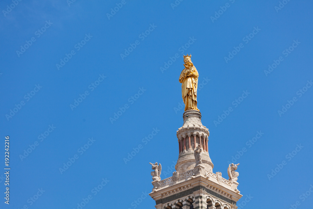 Fototapeta premium Gilded statue of Virgin with child in Marseille