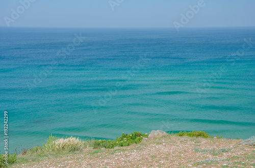 Turquoise ocean near Odeceixe, Portugal. photo