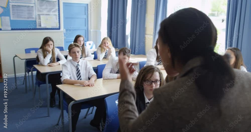 4k, Frustrated African American teacher talking students in a classroom. 4k, Frustrated African American teacher talking students in a classroom.