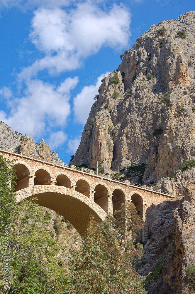 Bridge between cliffs in a limestone gorge at El Chorro - Malaga, Andalusia, Spain