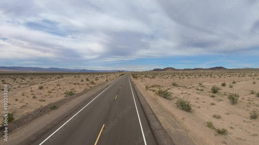 Aerial view of Route 66 pavement sign in the vast California Mojave desert. Aerial view of Route 66 pavement sign in the vast California Mojave desert.