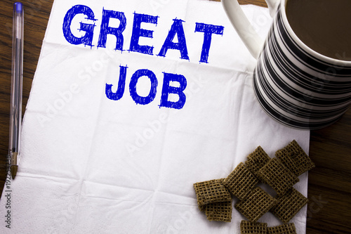 Hand writing text caption showing Great Job. Business concept for Success Appreciation written on tissue paper on wooden background with pen and healthy coffee in the restaurant photo