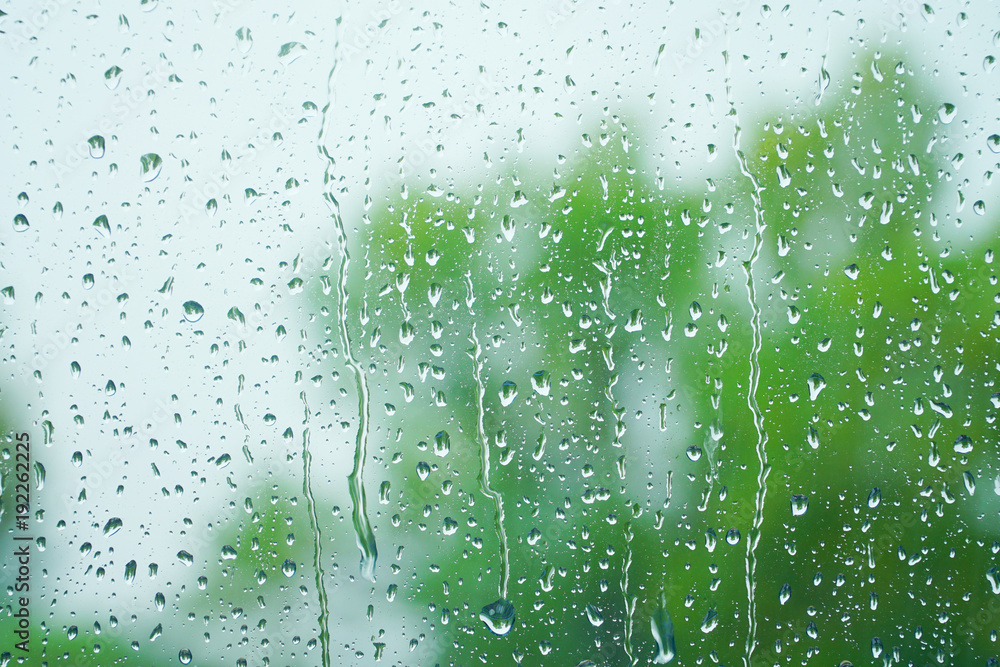 glass window with rain drop in spring