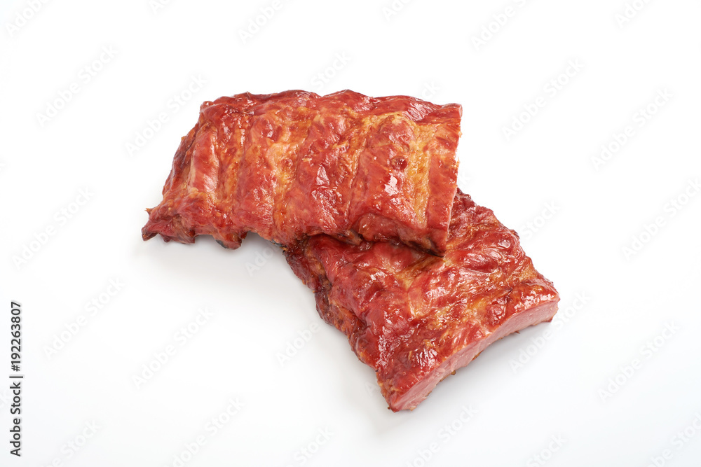 portion of delicious spicy marinated pork ribs isolated on white background.