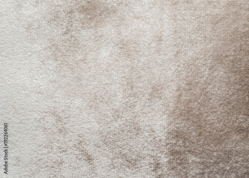 Beige velvet background or velour flannel texture made of cotton or wool with soft fluffy velvety satin fabric cloth metallic color material   