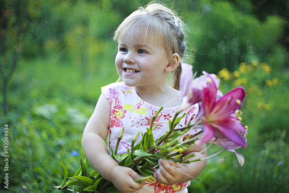 Beautiful white girl with a smile and a bouquet of flowers. Beautiful white girl with a smile and a bouquet of flowers.