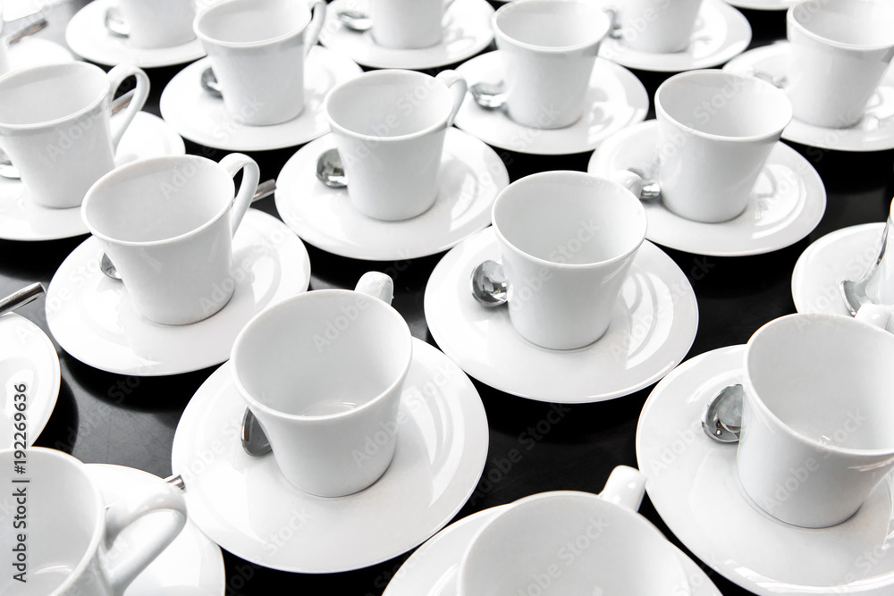 Group of ceramic white cup serving tea or coffee. Group of ceramic white cup serving tea or coffee.