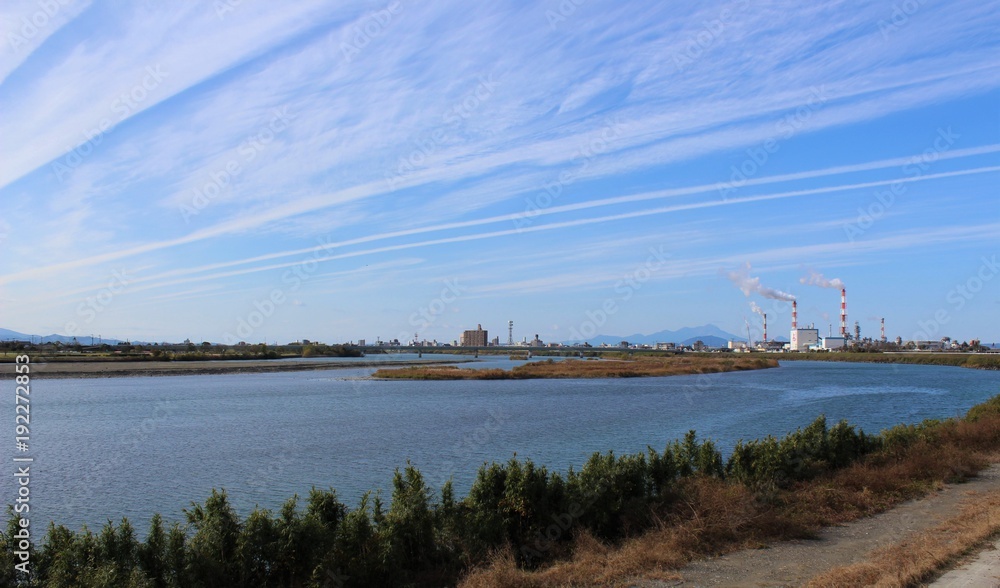 Autumn clouds over Kuma River in Yatsushiro City, Japan Autumn clouds over Kuma River in Yatsushiro City, Japan