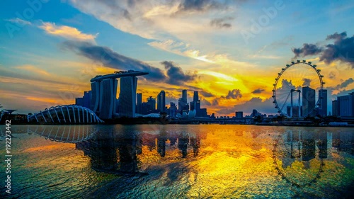 SINGAPORE CITY, SINGAPORE : Feb 12,2018: Singapore Skyline. Singapore`s business district, marina bay sand and the garden by the bay on sunset time-lapse photo