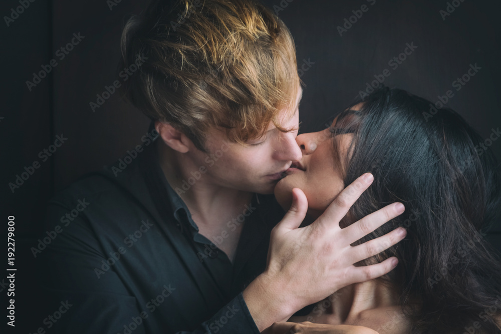Romantic couple touching and kissing each other Romantic couple touching and kissing each other