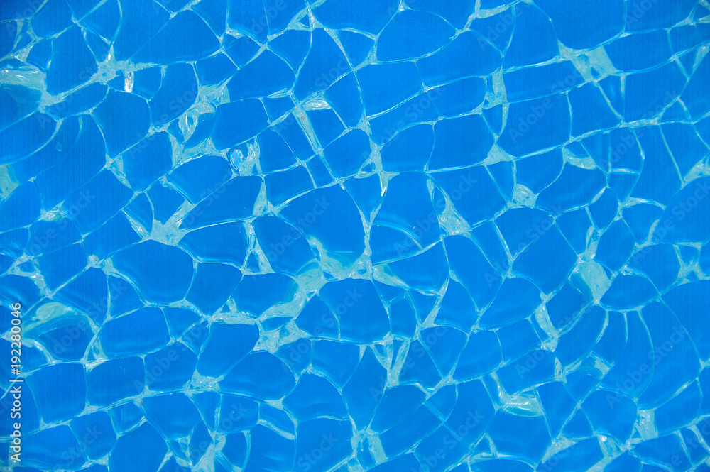Broken glass with blue background Broken glass with blue background