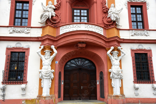 Eingangsportal mit Atlanten an der Thüringer Staatskanzlei in der ehemaligen kurmainzschen Statthalterei photo