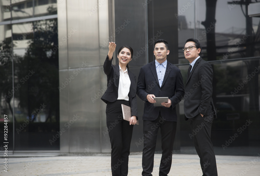Businessman and businesswoman partner consulting and discussing at outdoor. Businessman and businesswoman partner consulting and discussing at outdoor.