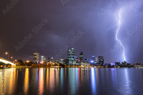 Perth city in Western Australia at night with multiply lightning strikes