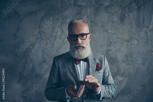 Fotografía Professional, experienced, cunning, old gambler in tux with bow, glasses, shuffl