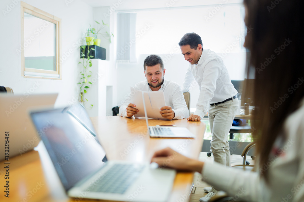 Picture of businesspeople working in modern office Picture of businesspeople working in modern office