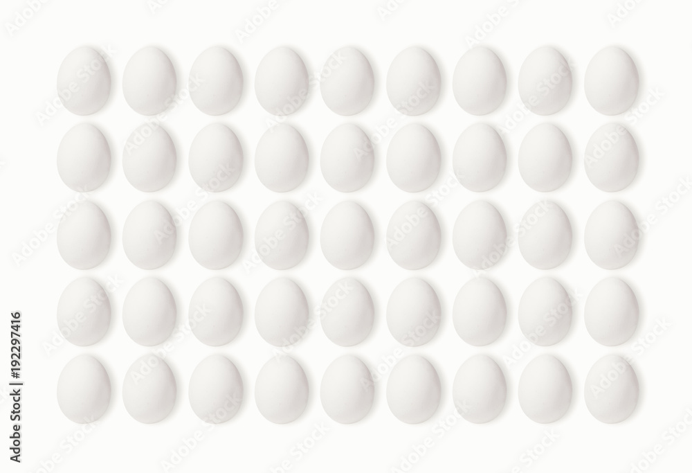 Set of eggs on a white background, laid in a line. 