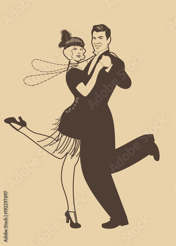 Couple wearing clothes in the style of the twenties dancing Charleston