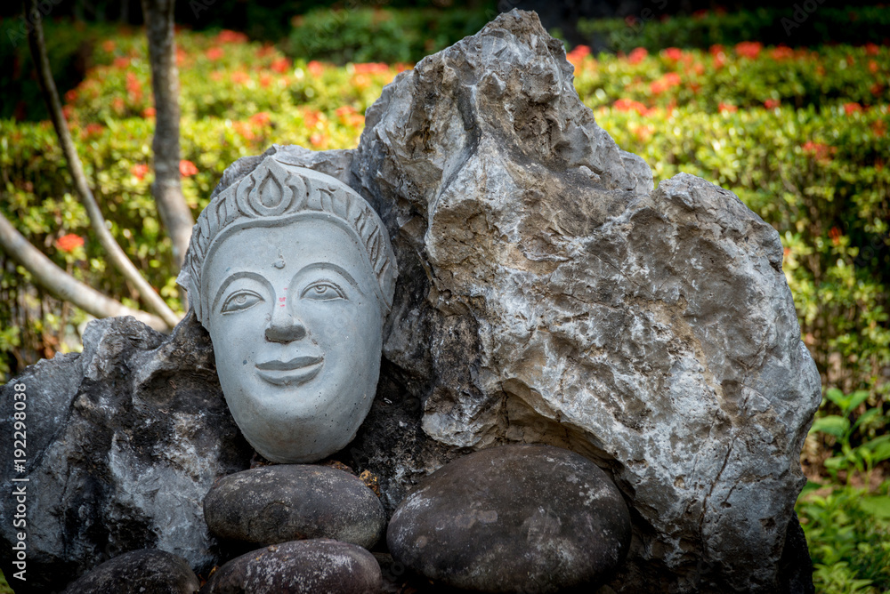 Buddha mask at a temple in Vientiane Laos Buddha mask at a temple in Vientiane Laos