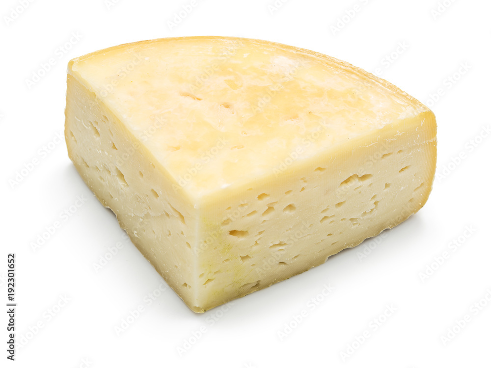 Piece of homemade cheese on the white background.