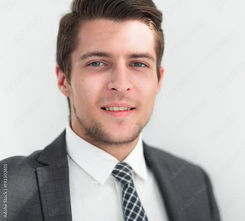 closeup.the face of a successful young man closeup.the face of a successful young man