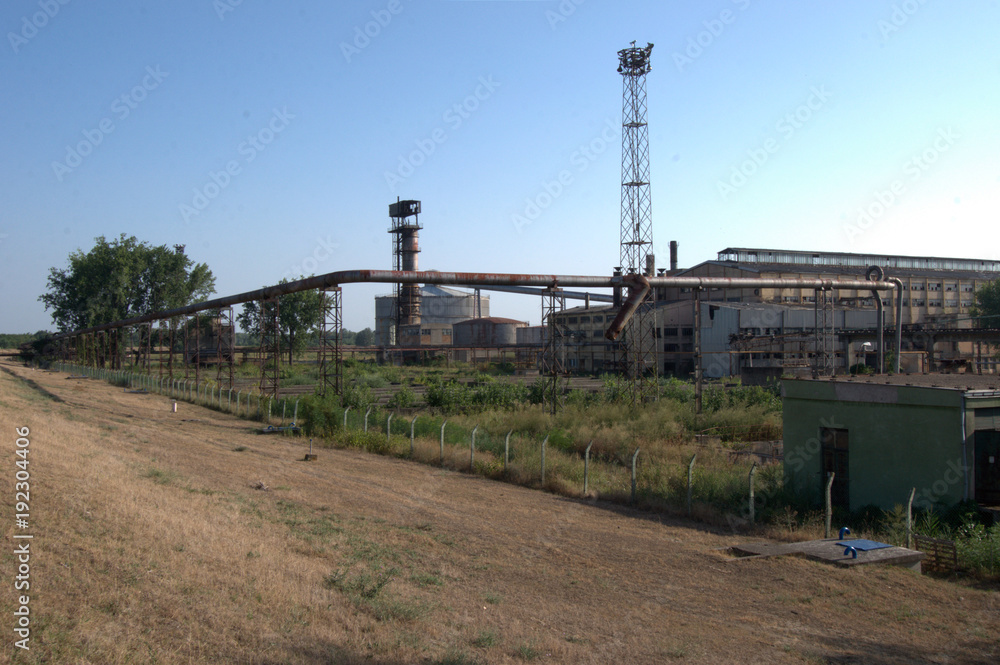 Old rusty power plant / power plant rusty probably use of natural gas for steam and electricity production Old rusty power plant / power plant rusty probably use of natural gas for steam and electricity production