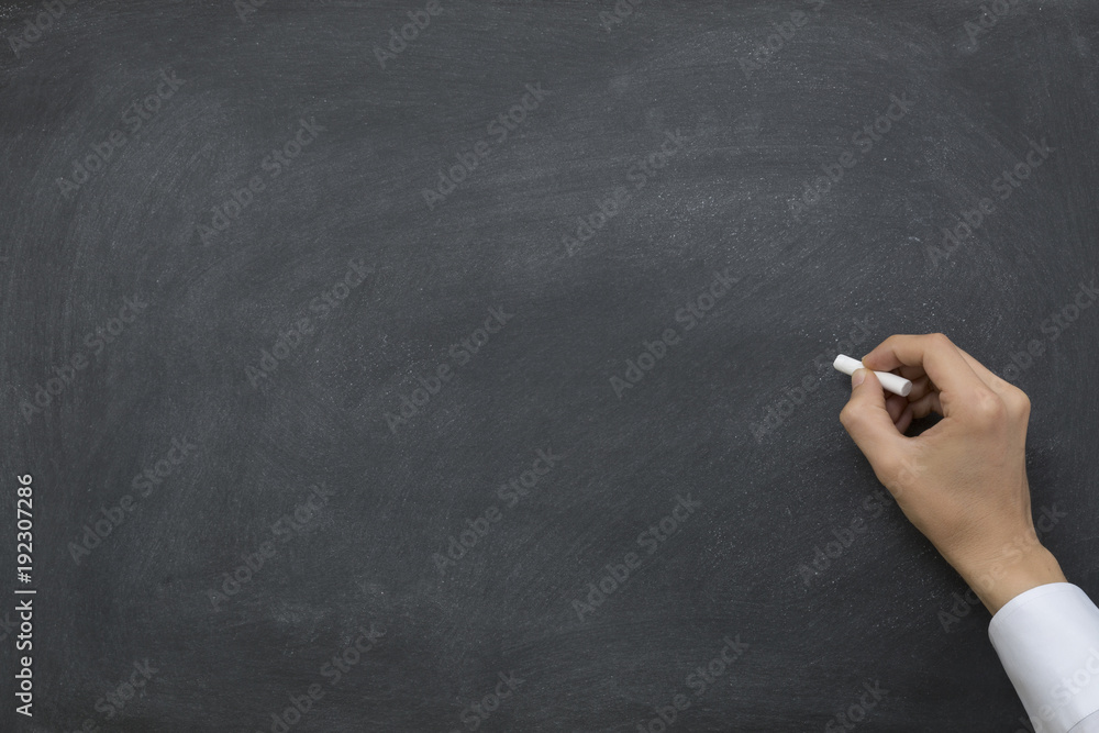 Hand writing on chalkboard / blackboard Hand writing on chalkboard / blackboard
