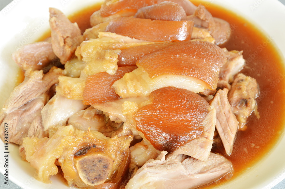 braised pork leg with black Chinese herb soup slice on plate braised pork leg with black Chinese herb soup slice on plate