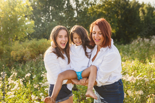 happy family, mother with daughters